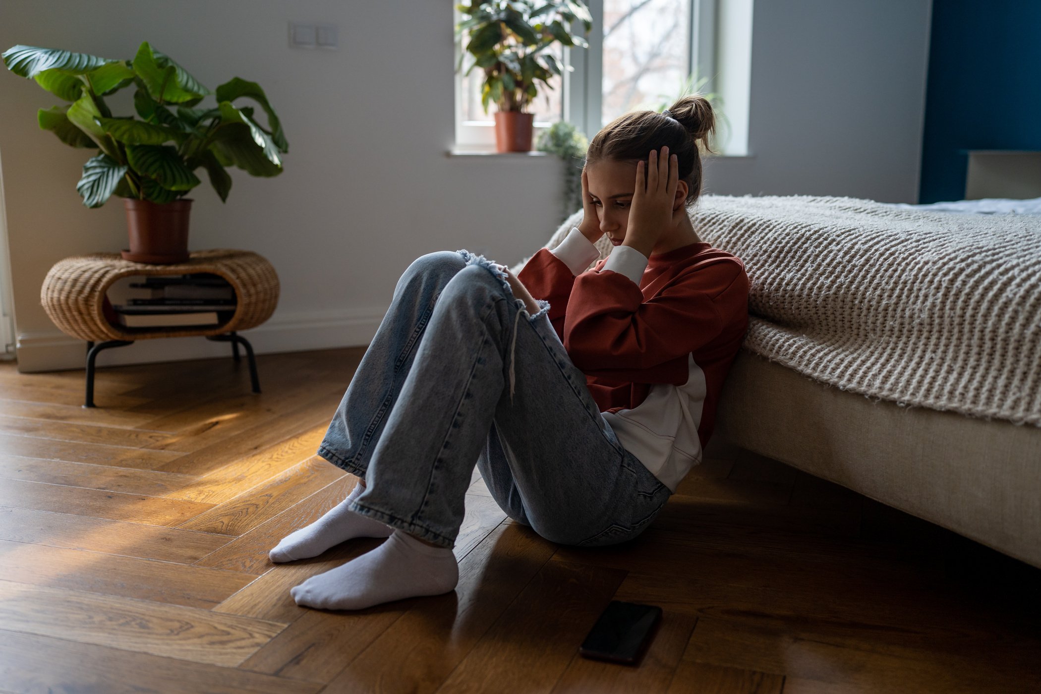 Frustrated teenage girl being bullied online, unhappy teen child dealing with first love heartbreak